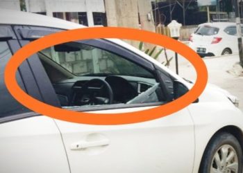 Kaca mobil pecah, diduga akibat ulah pelaku saat mencuri uang Rp249 juta milik Koperasi Anugerah usai diambil dari sebuah bank di Sampit, Kamis (30/1/2020). (ist)