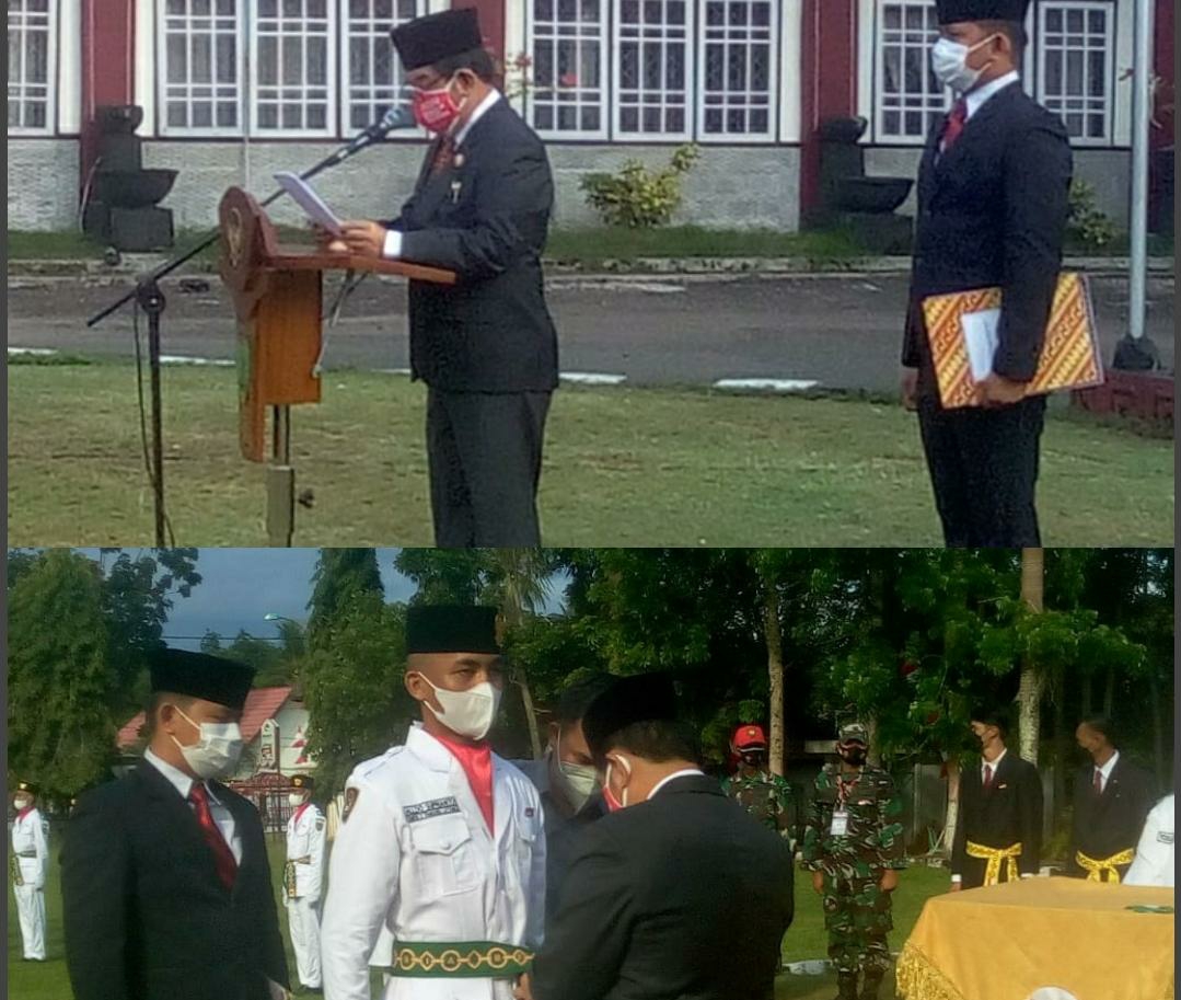 Bupati Barito Timur Ampera AY Mebas saat mengukuhkan 36 anggota Paskibraka di Halaman Kantor Bupati setempat, Sabtu (14/8/2021)