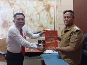 Kepala Pelaksana Badan Penanggulangan Bencana Daerah (BPBD) Kabupaten Katingan, Markus, memperkenalkan Rancangan Proyek Perubahan (RPP) Akselerasi Implementasi Desa Tangguh Bencana (Destana) kepada Bupati Katingan Saiful